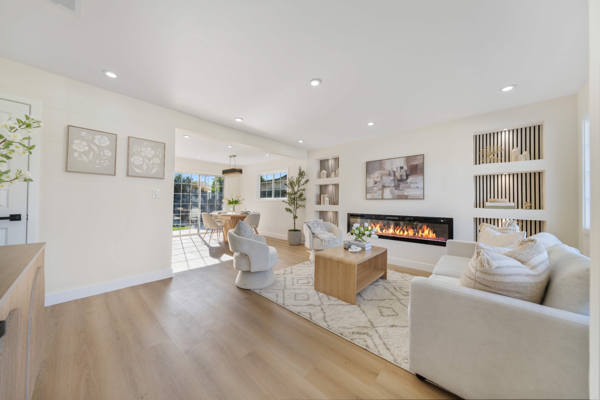 Staged living room with linear fireplace by ONSTAGE